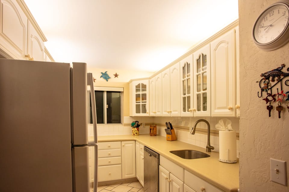 Full Kitchen with full sized appliances toaster, blender, Ice Maker in freezer. 