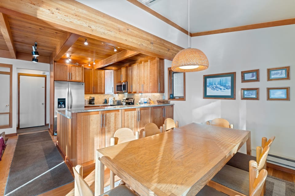 View from the kitchen toward the family room and dining areas