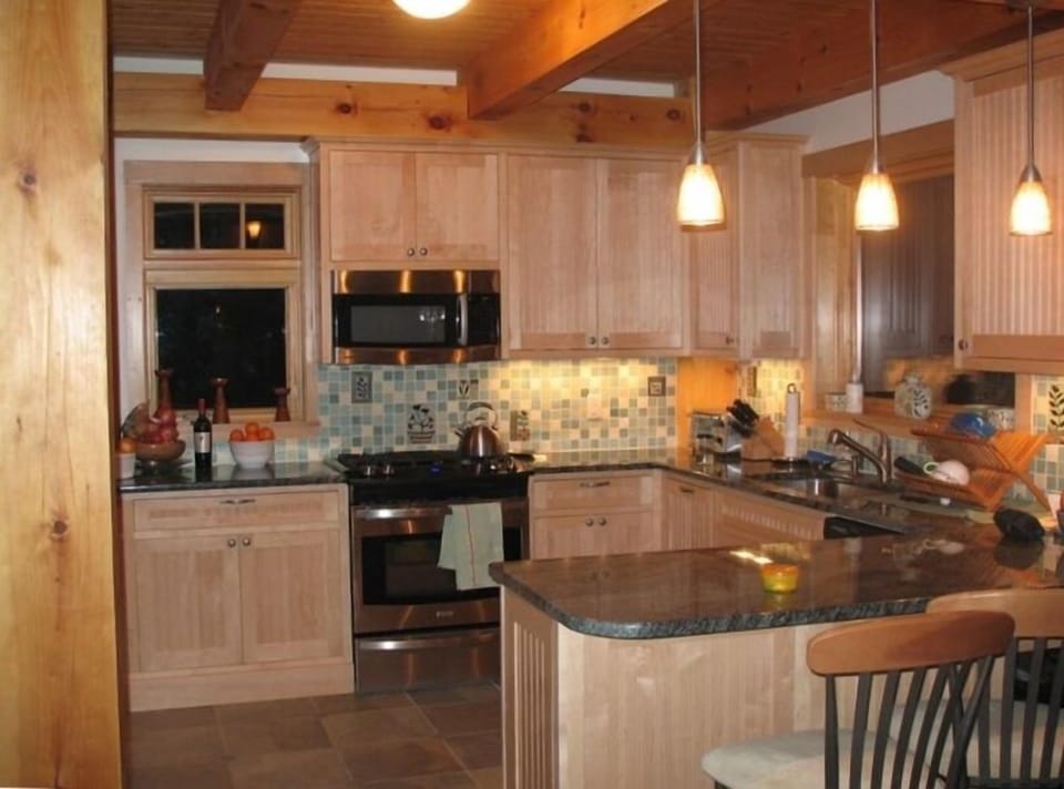 The tile work in all bathrooms and kitchen are unique hand made tiles