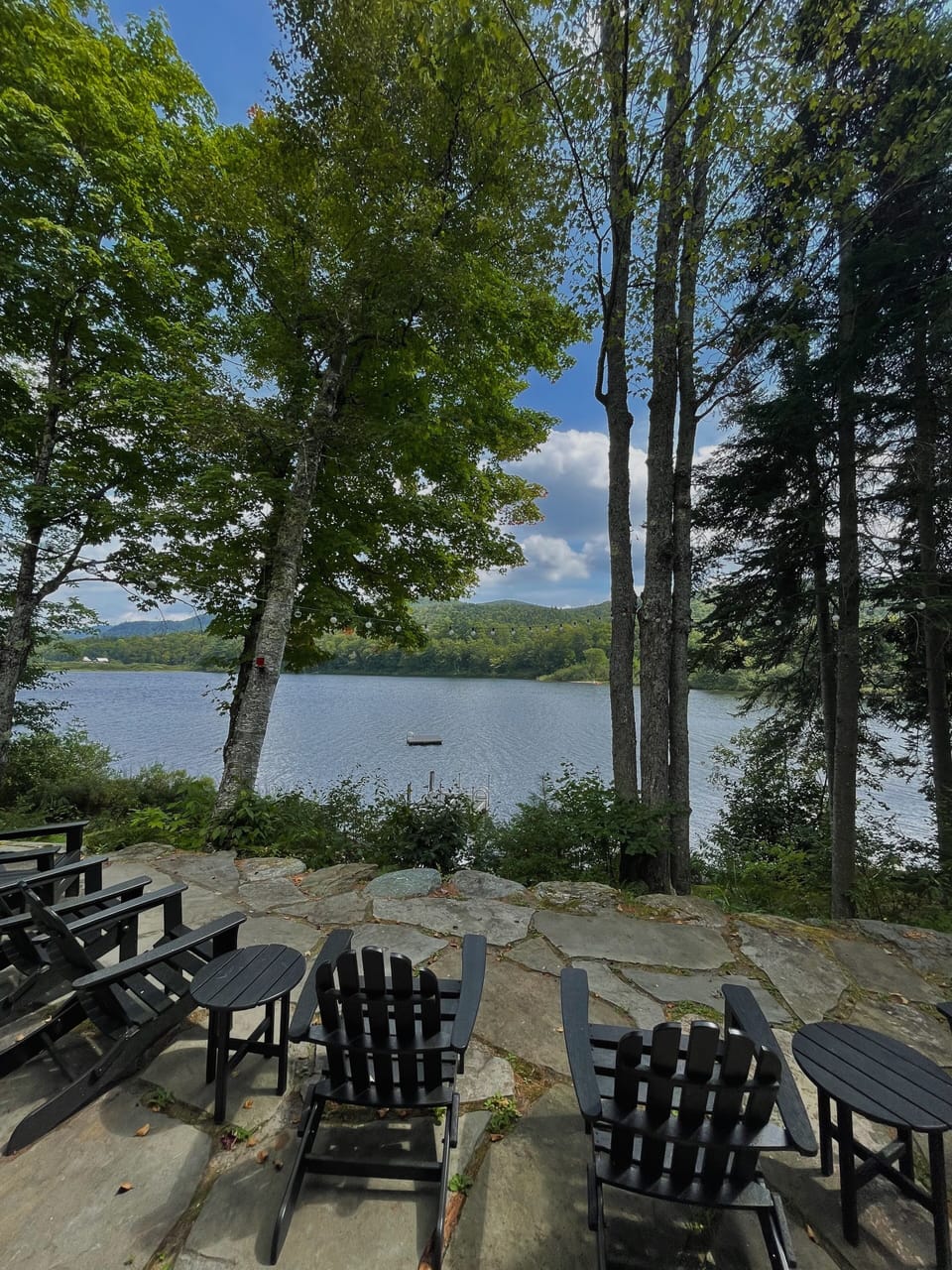 Backyard sitting area lake view.