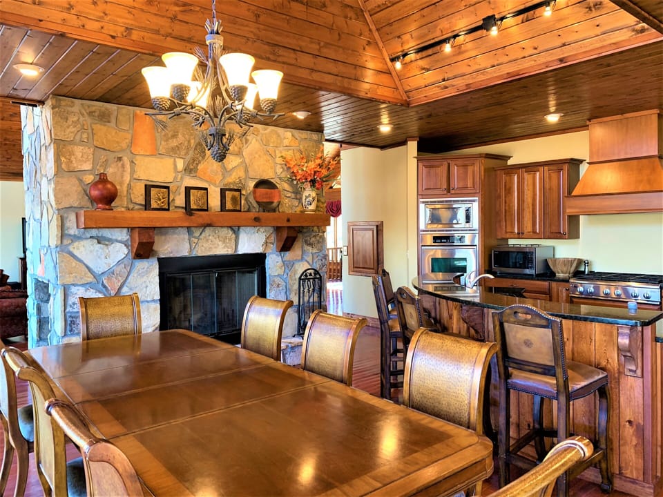 Large dining table and island offer seating for 12.