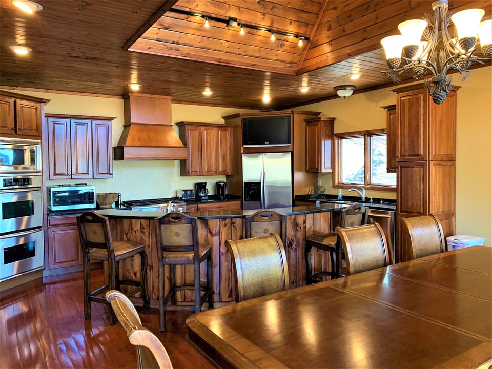 Spacious kitchen with double ovens, gas cook top 2 dishwashers and 2 microwaves.
