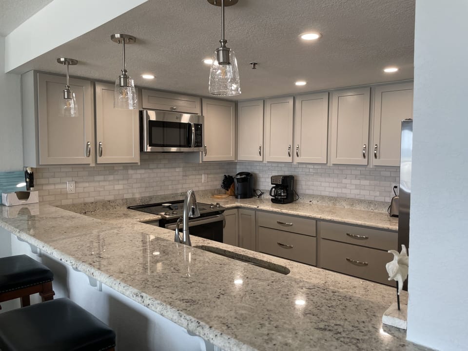 View of Kitchen from Den