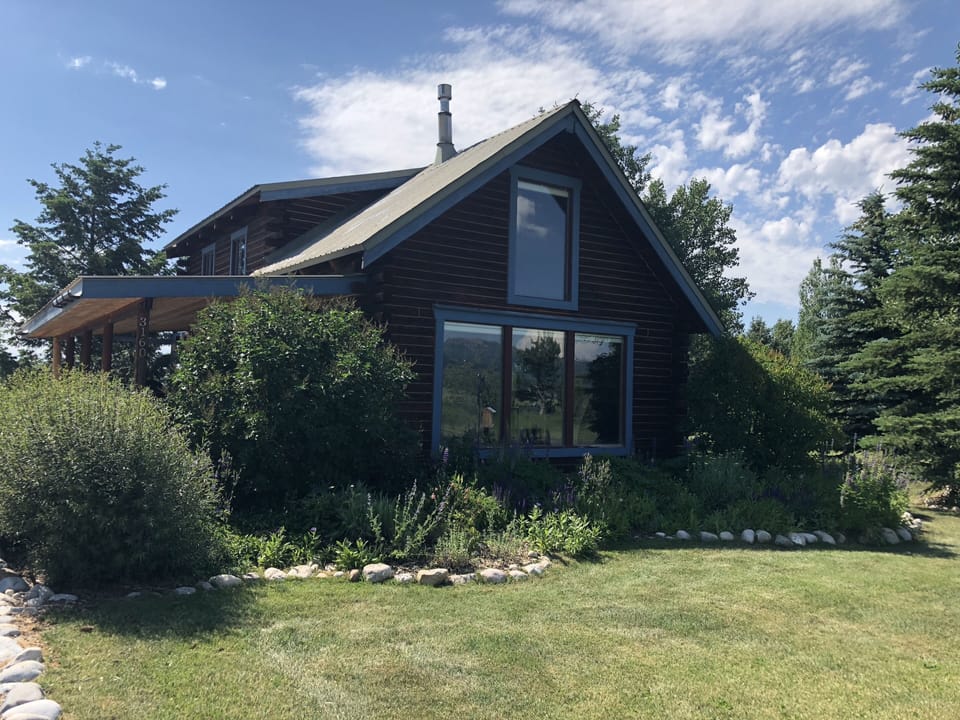 Summer view of front of cabin