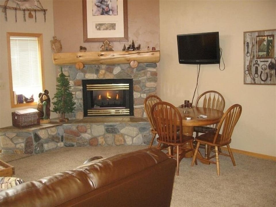 Relax in front of the fire or in the private hot tub right outside your door