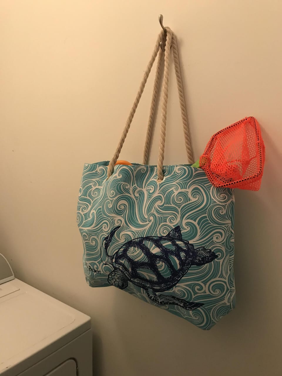 Beach bag with sand toys