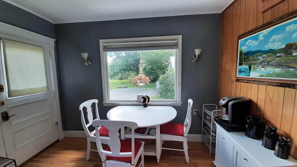 Kitchen nook table expands for seating for 4.