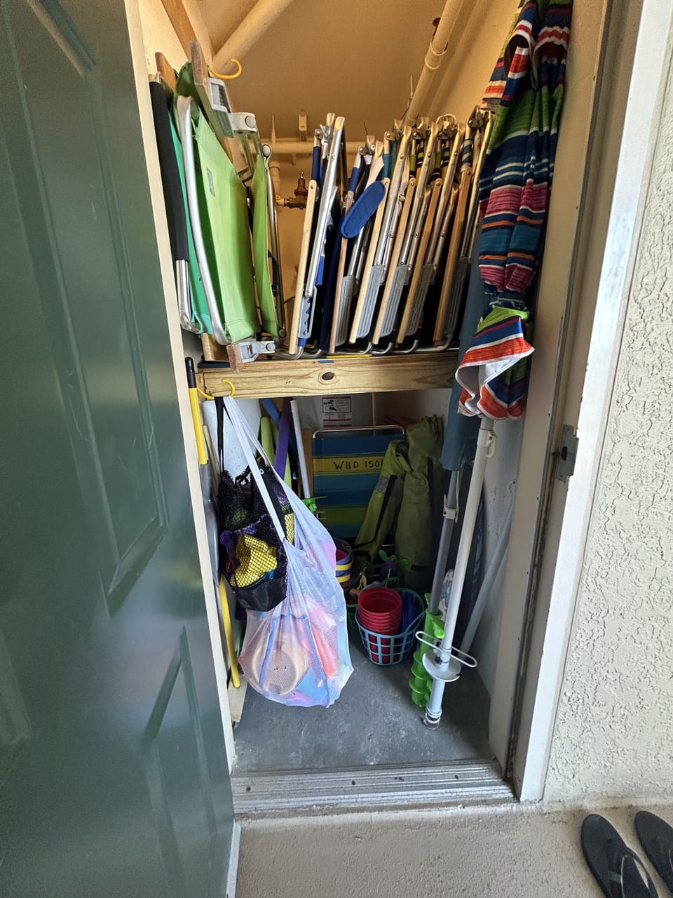 Outdoor storage for chairs, umbrellas and toys available for your use.
