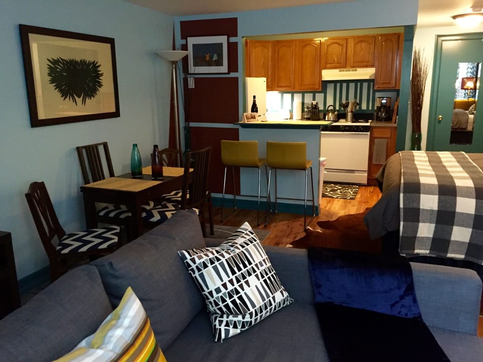 Studio is divided into living, sleeping and dining areas.  