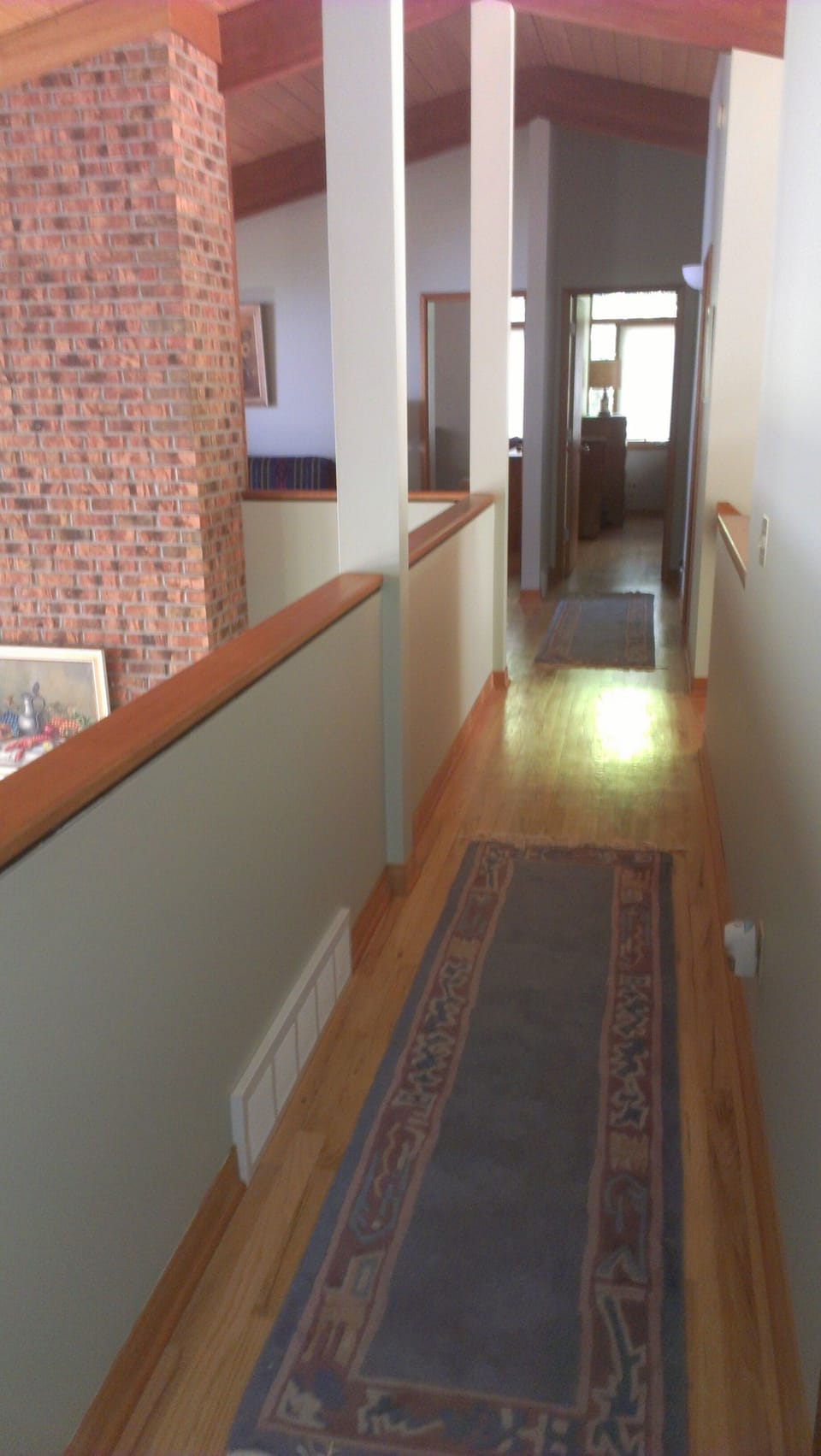 upstairs hall with loft on left, bathroom on right and bedrooms 2 & 3  ahead