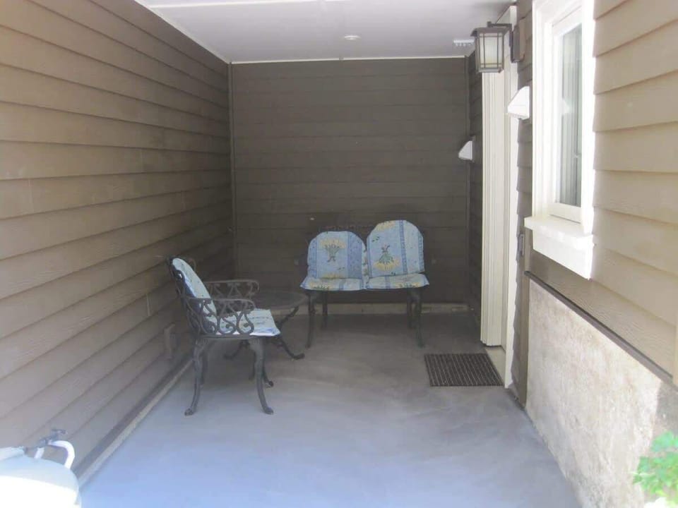 Covered entrance to suite.  Door on the right.