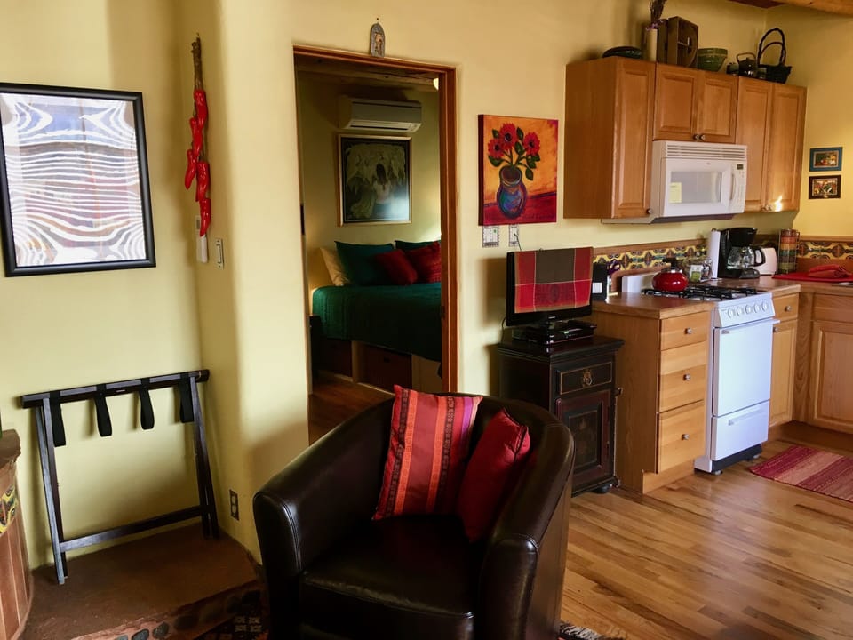 looking into bedroom and small ( covered) digital TV