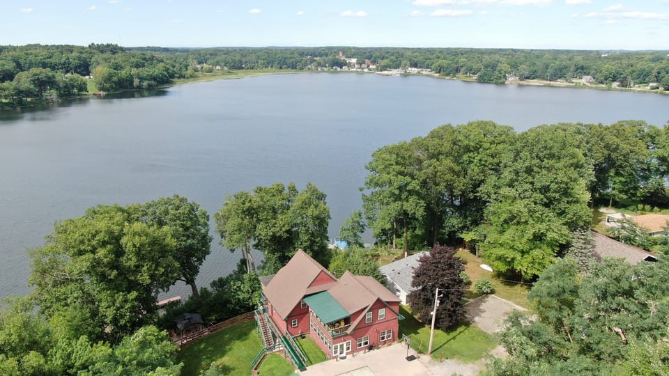The Knotty Pine Lodge sits at the very end of Lakeshore Dr on quiet Stone Lake