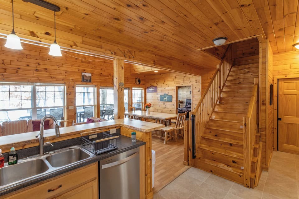 Kitchen opens to the great room and deck, with wonderful views of Stone Lake.