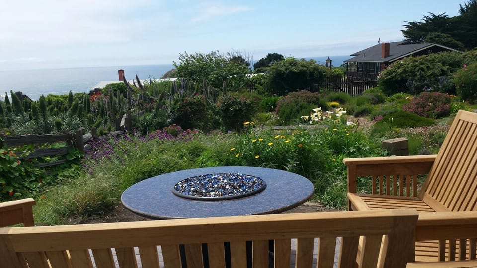 gas fire-pit on the property, with ocean views