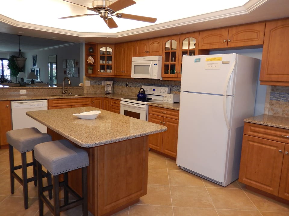 Kitchen with extensive amount of cookware and barbeque equipment