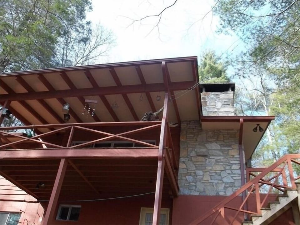 The deck is off the great room and looks down over Trout Lake.