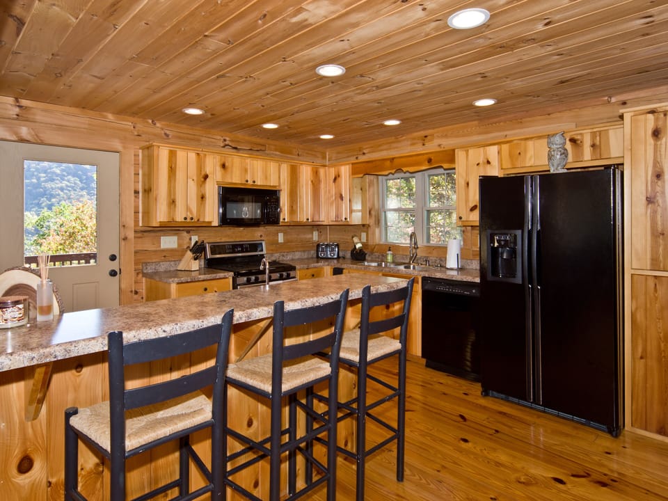 Bar seating and kitchen