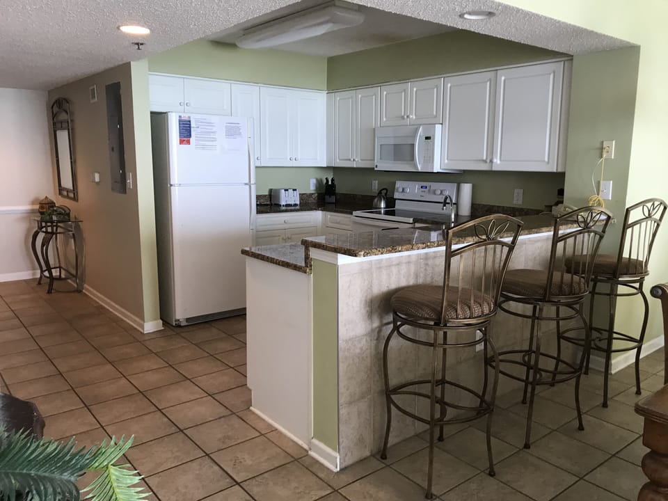 Full Size fully equipped kitchen with newer refrigerator (2023)