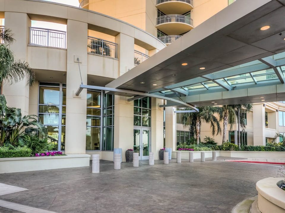 Covered driveway and luggage carts for your convenience at the entrance. 