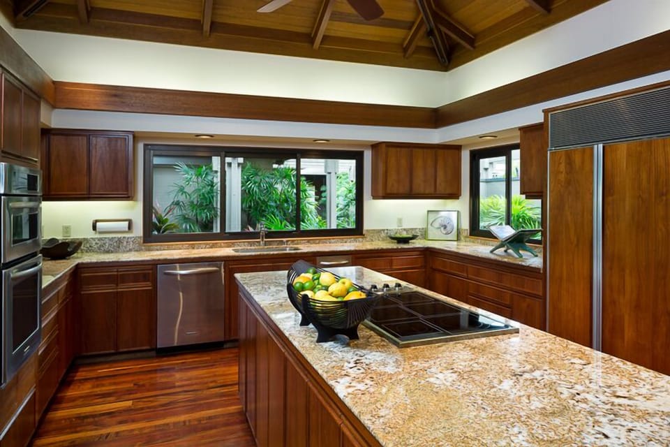 Spacious kitchen with wolf induction cooktop.