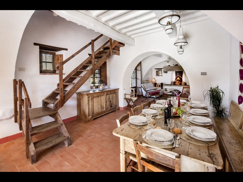 Dining room and stairs leading to the first floor