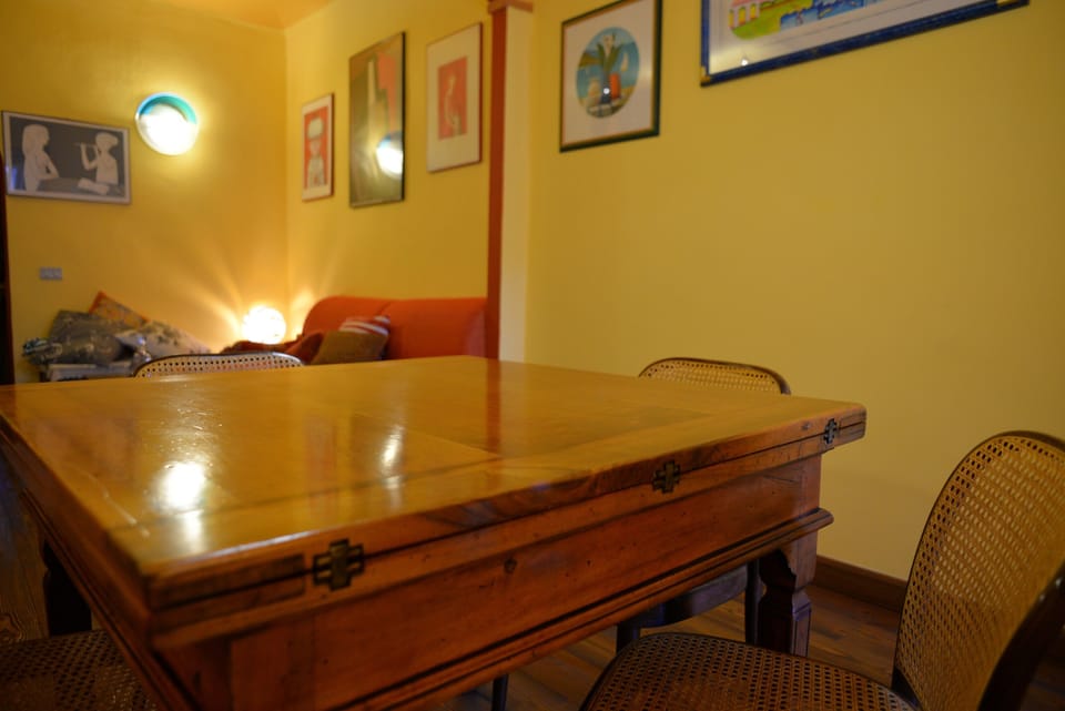 The dining table " a libretto" an antique folding table  restored 