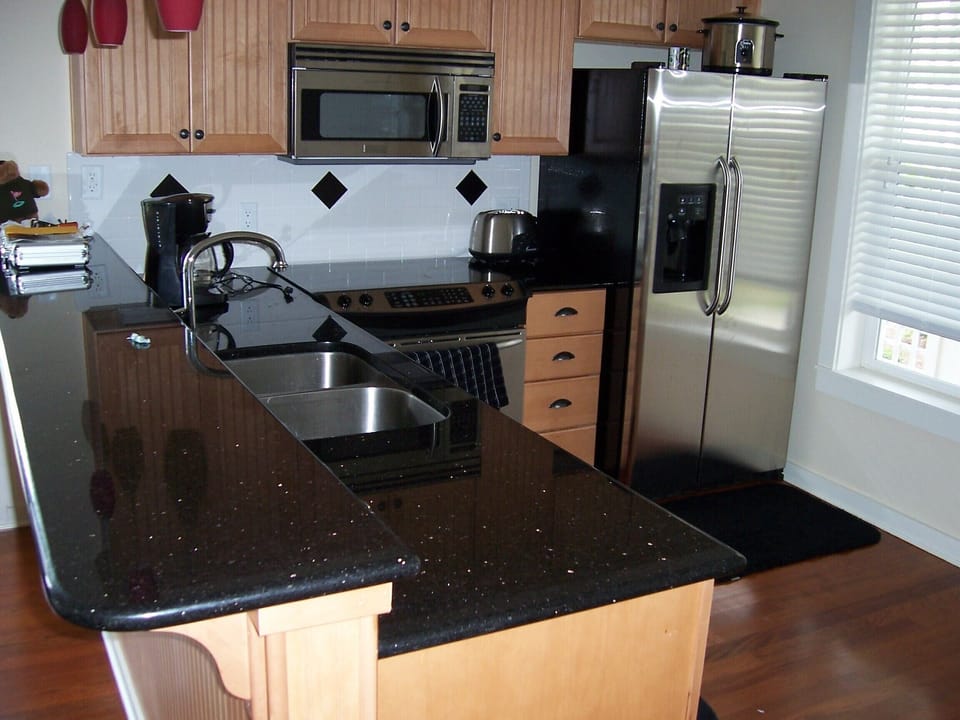  Kitchen Complete with Granite Counters and  New Stainless Appliances.