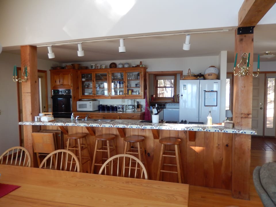 Kitchen.  Walk-in pantry and laundry are through door to left of refrigerator.