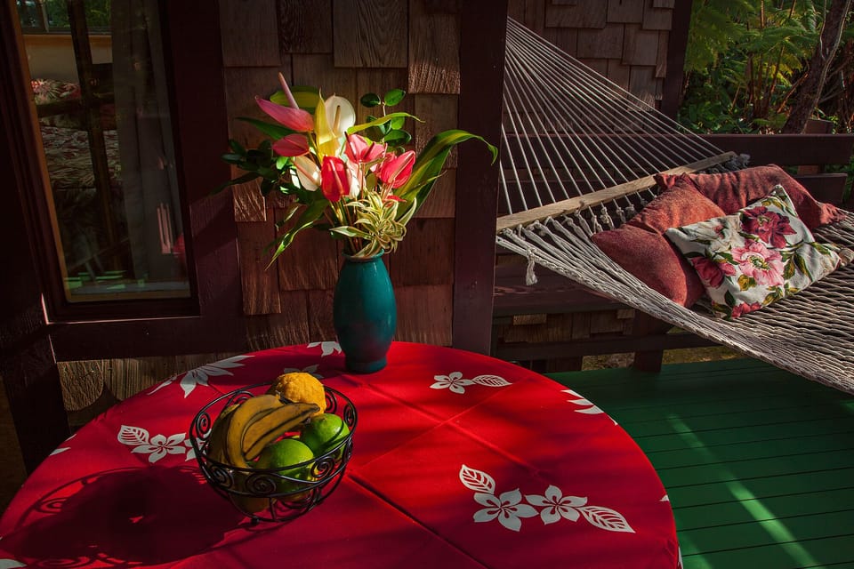 Porch table has four chairs.