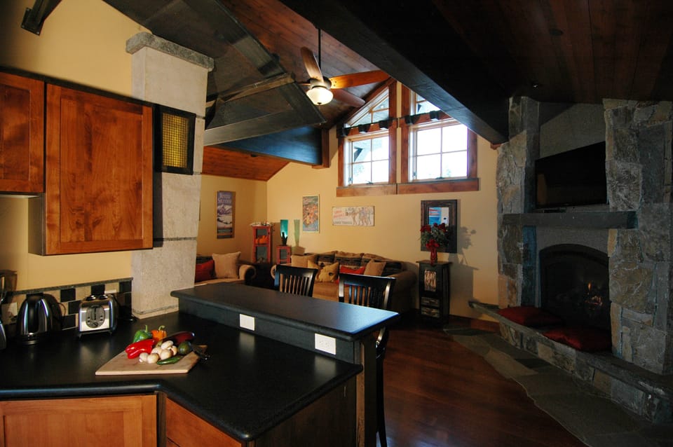 Eagles nest (bedroom 8) kitchen, fireplace, fold out couch and views)