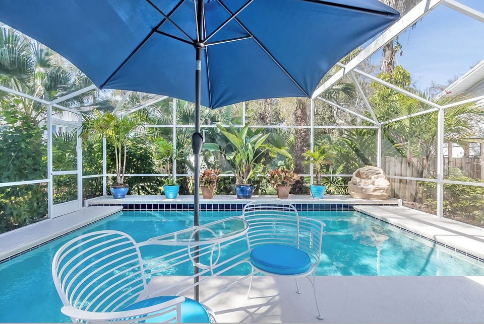 Enjoy the tropical pool oasis & waterfall.