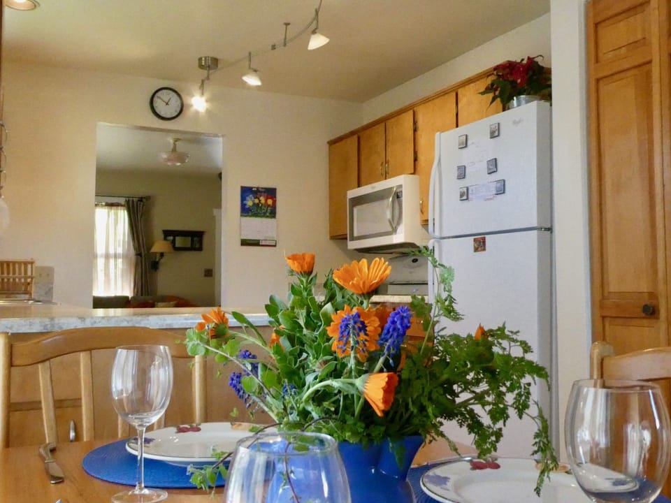 Kitchen with full sized appliances and fully equipped for cooking and baking.