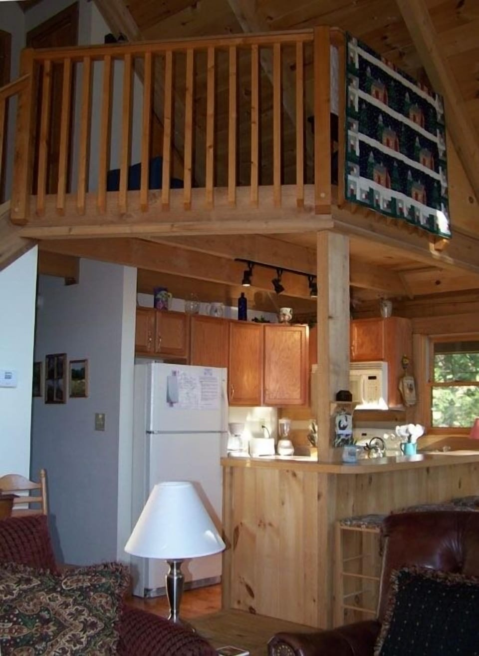 View showing kitchen and loft