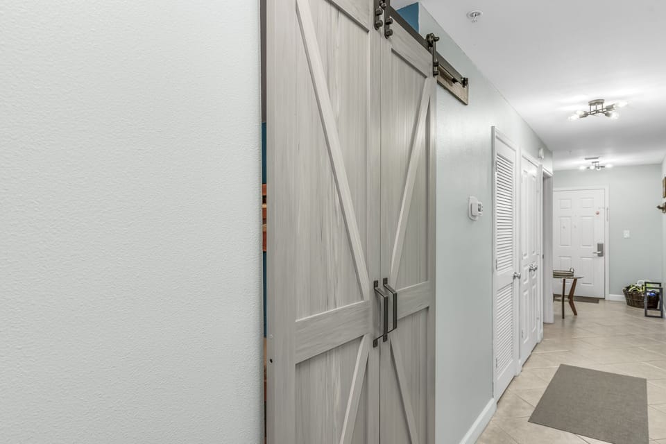 Barn doors lead to the Bunk Room