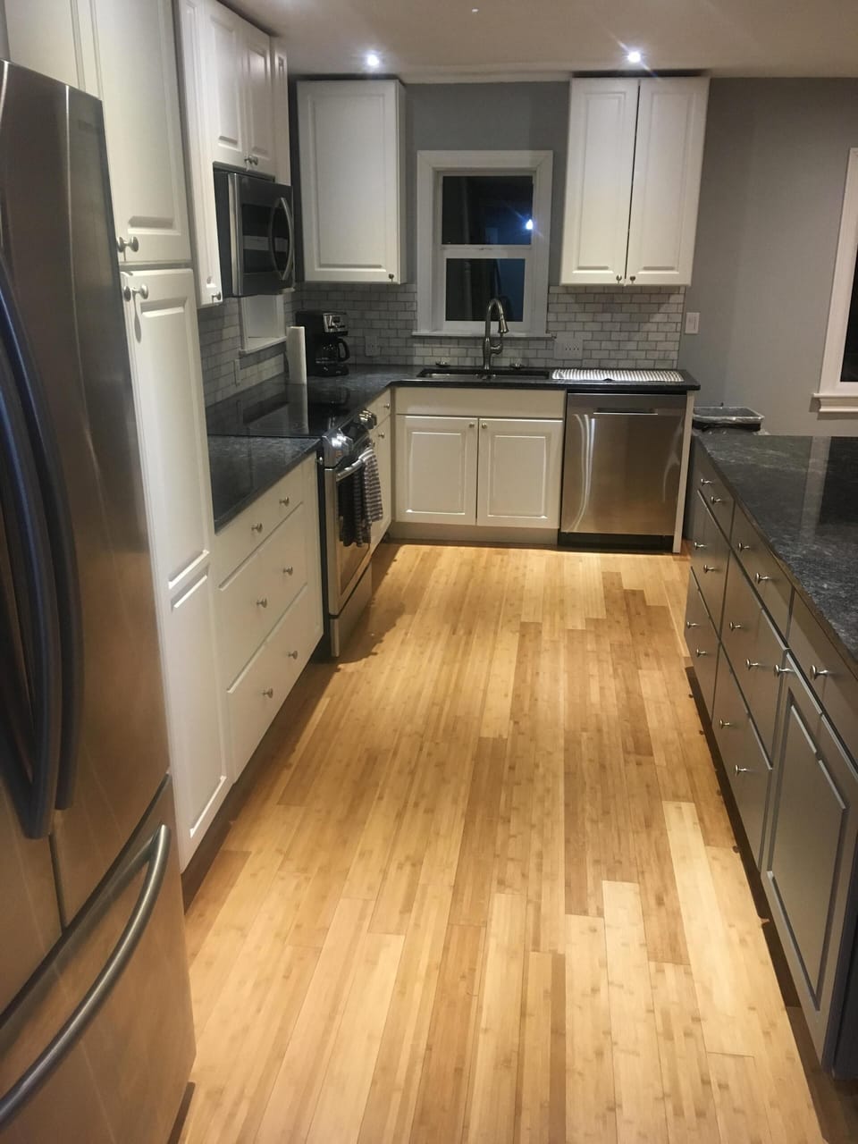 Kitchen - Includes large refrigerator/freezer