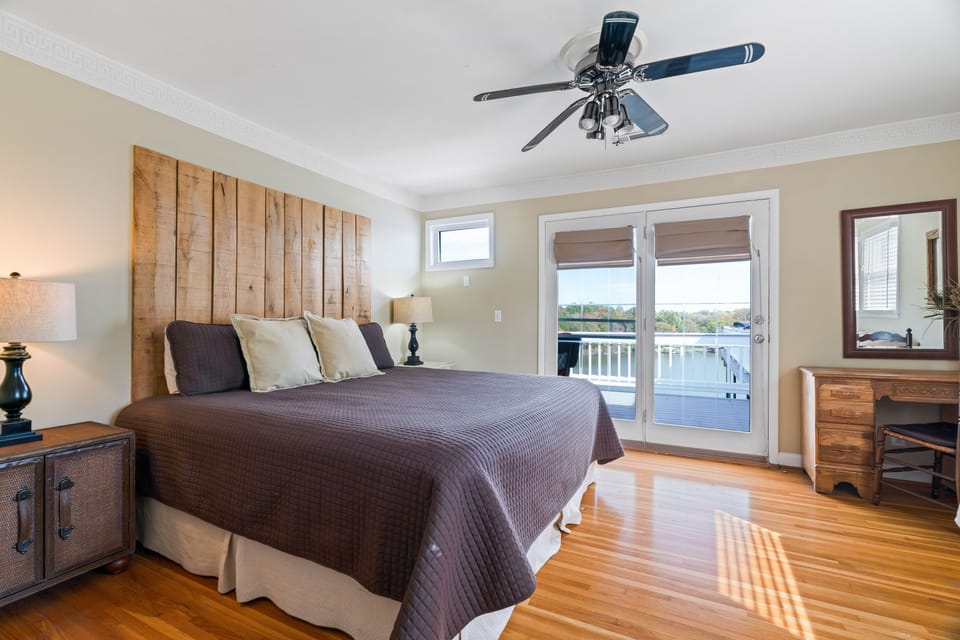 Master Bedroom with private deck and view of lake