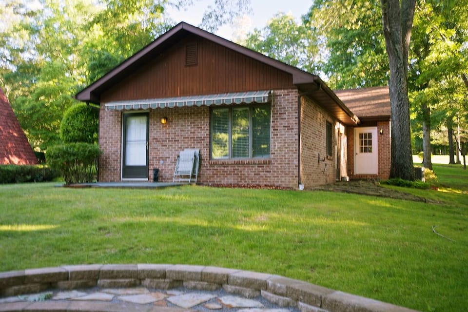 Guest Cottage. 2 queen beds, sleeper sofa, kitchen, attached game room.  