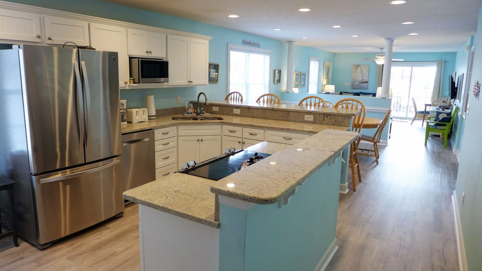 Updated kitchen with granite counters and new appliances.