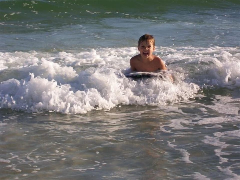 Boogie boarding!!!  Awesome time with family!!