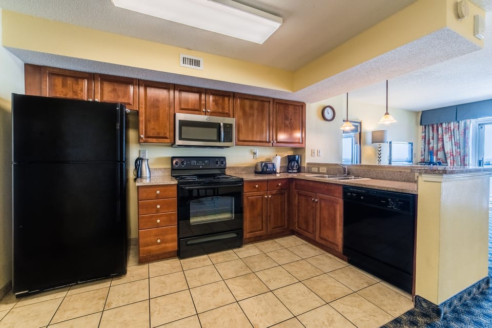 Open Plan Kitchen with Granite Counter Top