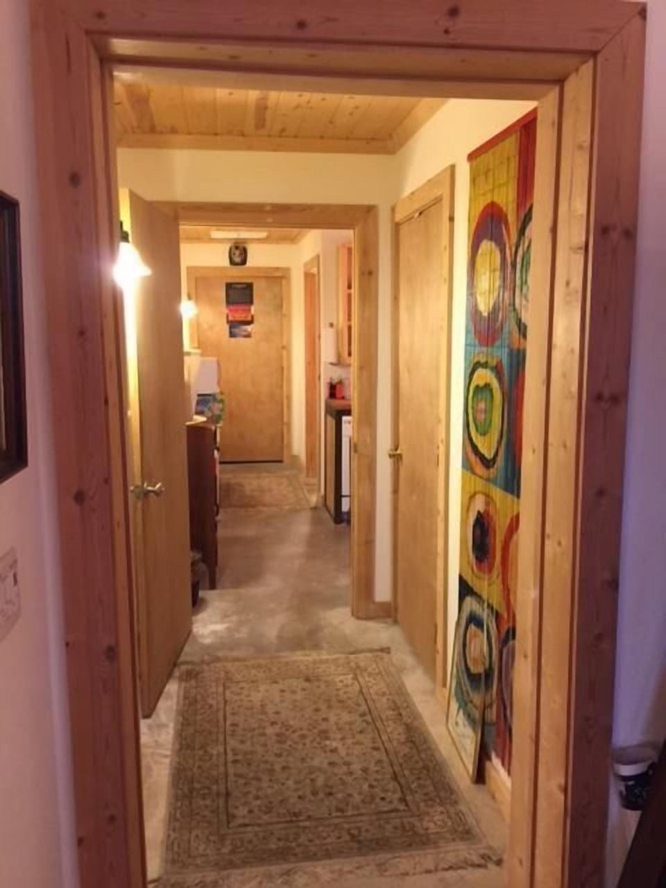 The hallway: kitchen to the right, master to the left, bathroom next to kitchen