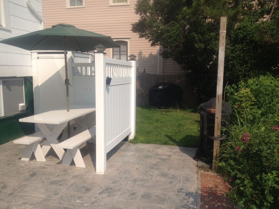 Private Patio and Outdoor Shower - hot and cold water. Grill adjacent to patio.