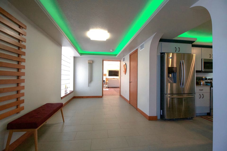 Long hallway  to great room to side Kitchen.