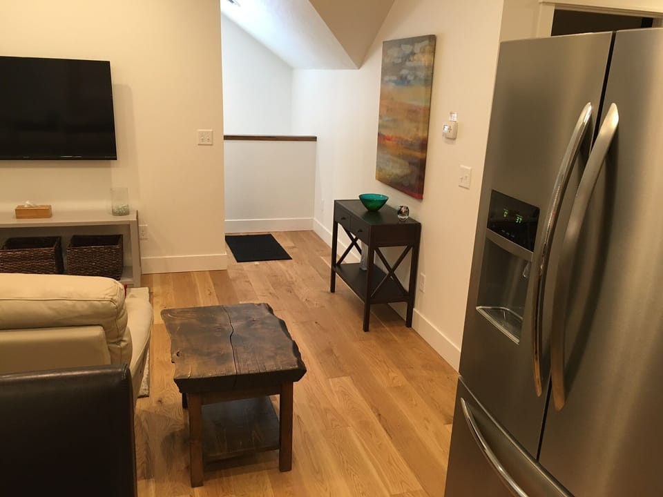 Open floor plan between the kitchen and living room.