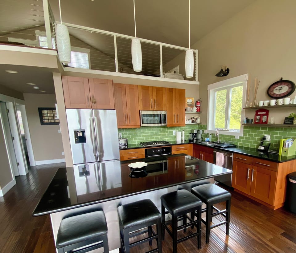 Kitchen with loft above 
