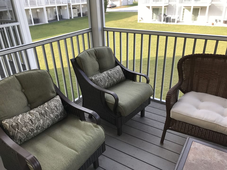 Enclosed porch off of living room.