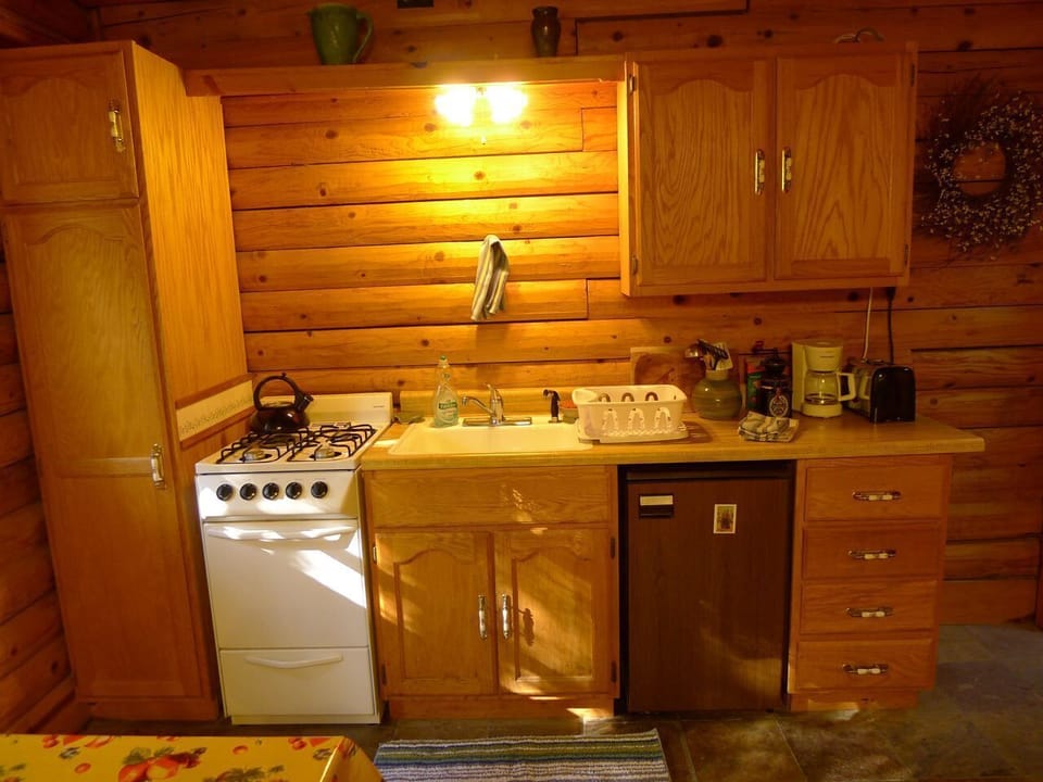 The efficient kitchenette comes fully equipped including microwave.