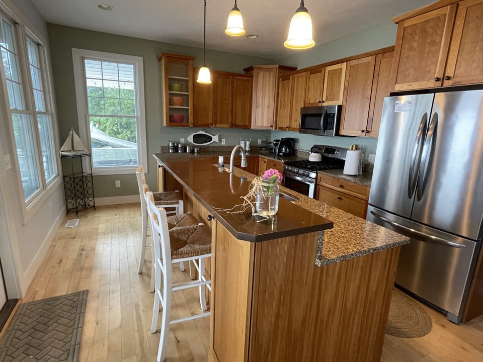 Kitchen loaded with all the dishes, glasses and all the appliances you need!
