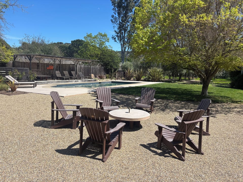 Outdoor sitting area with table and built in light